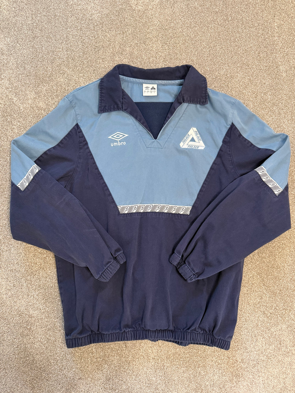 Palace x Umbro drill top