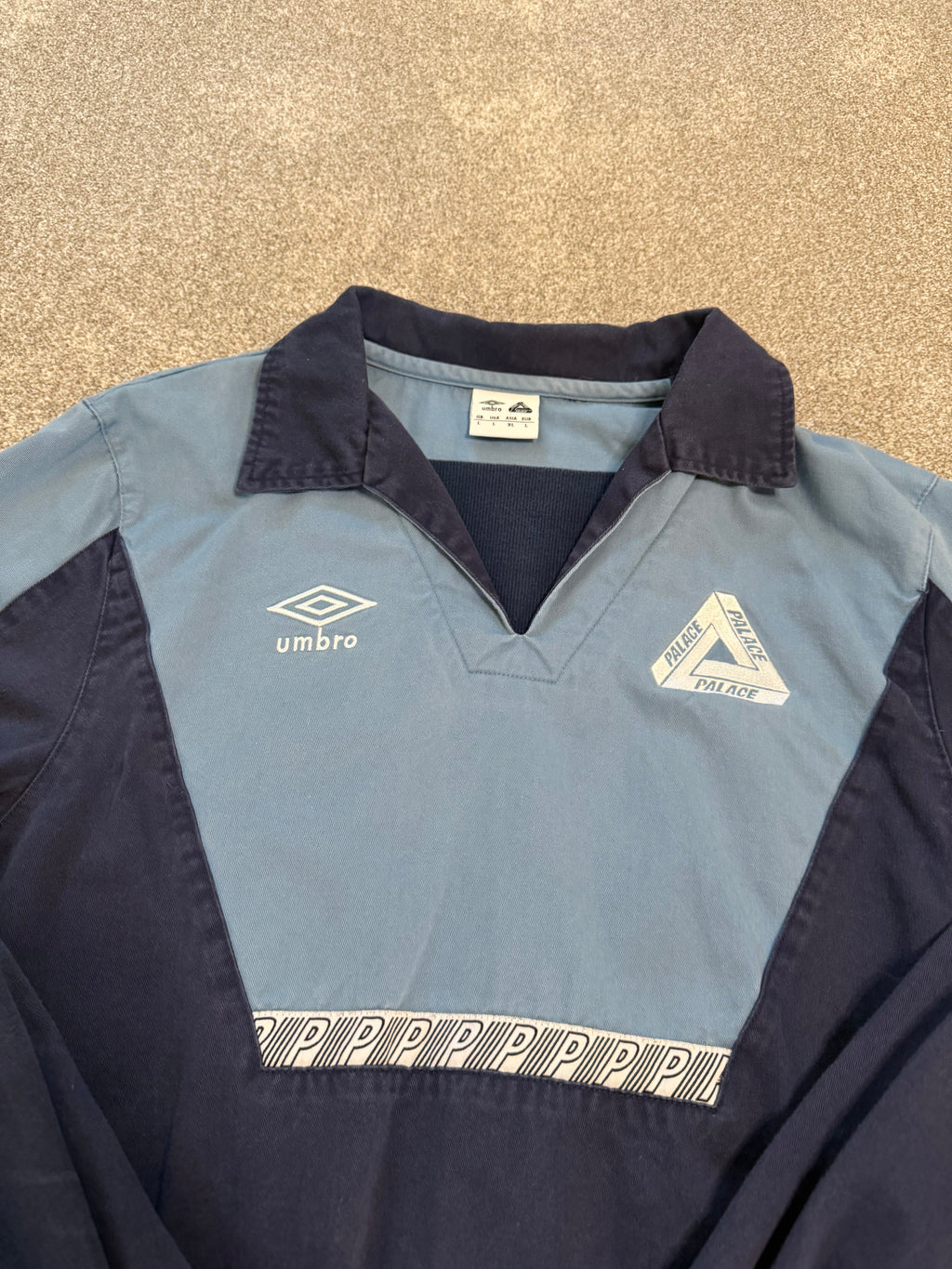 Palace x Umbro drill top