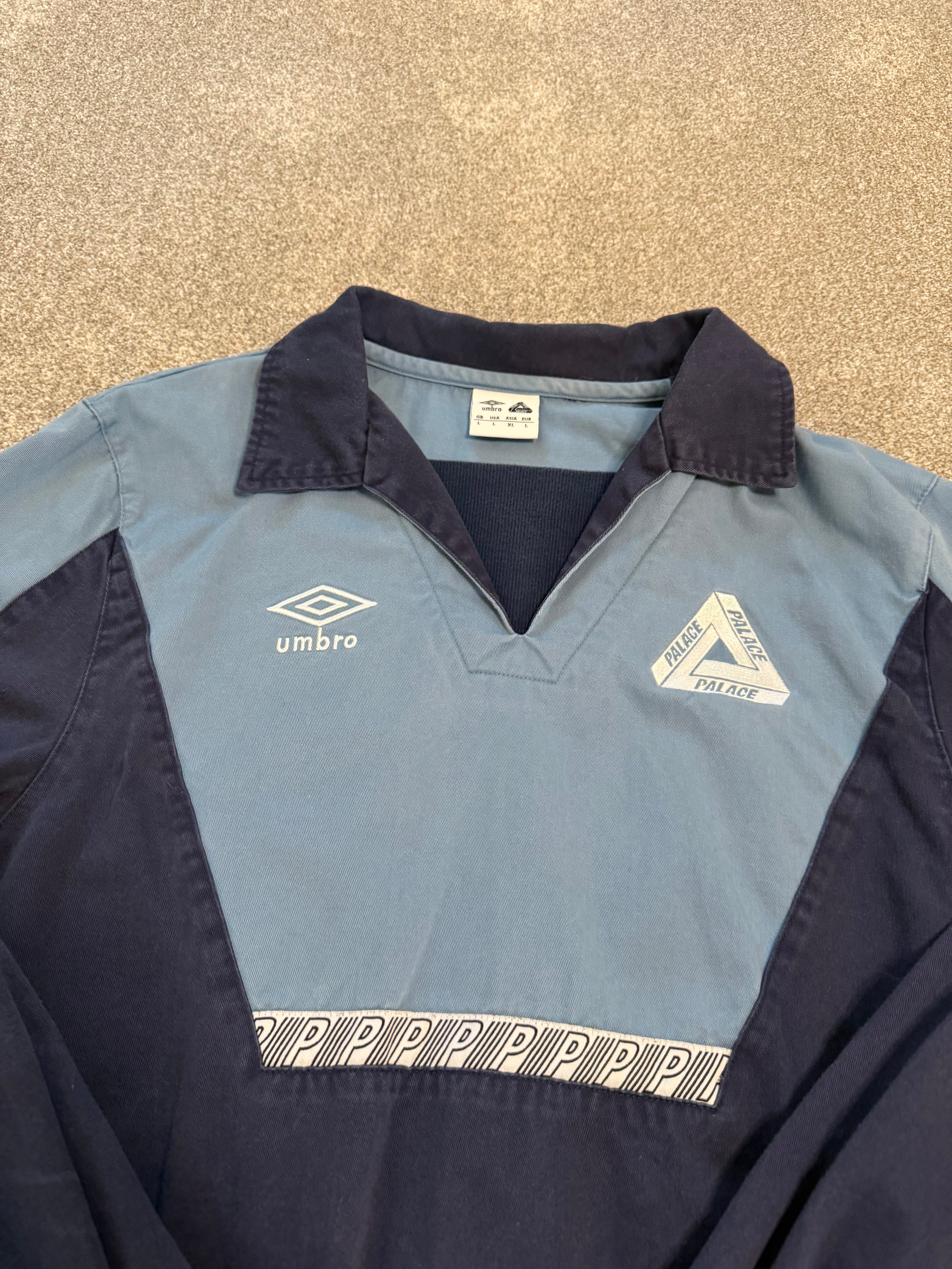 Palace x Umbro drill top