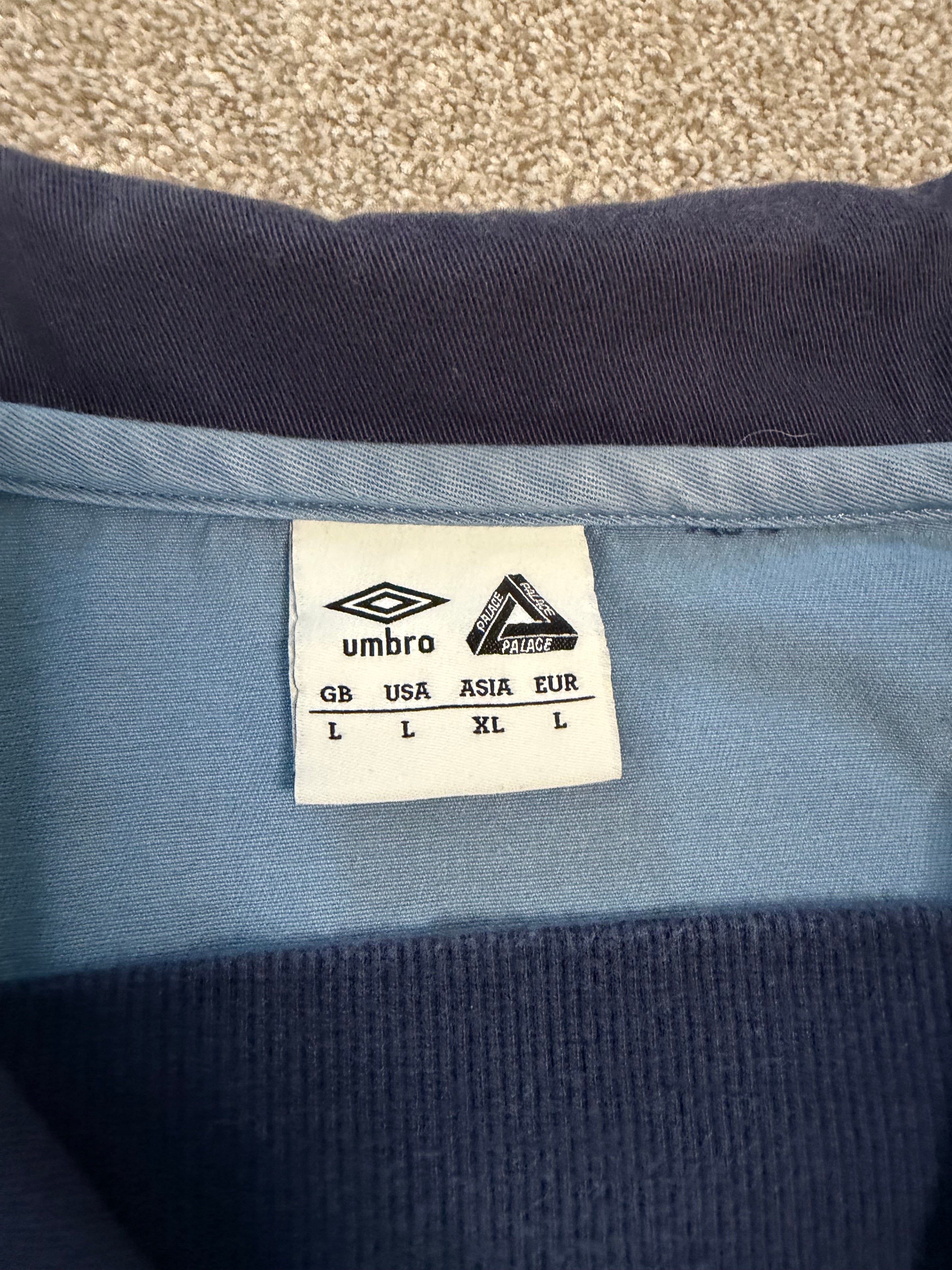 Palace x Umbro drill top